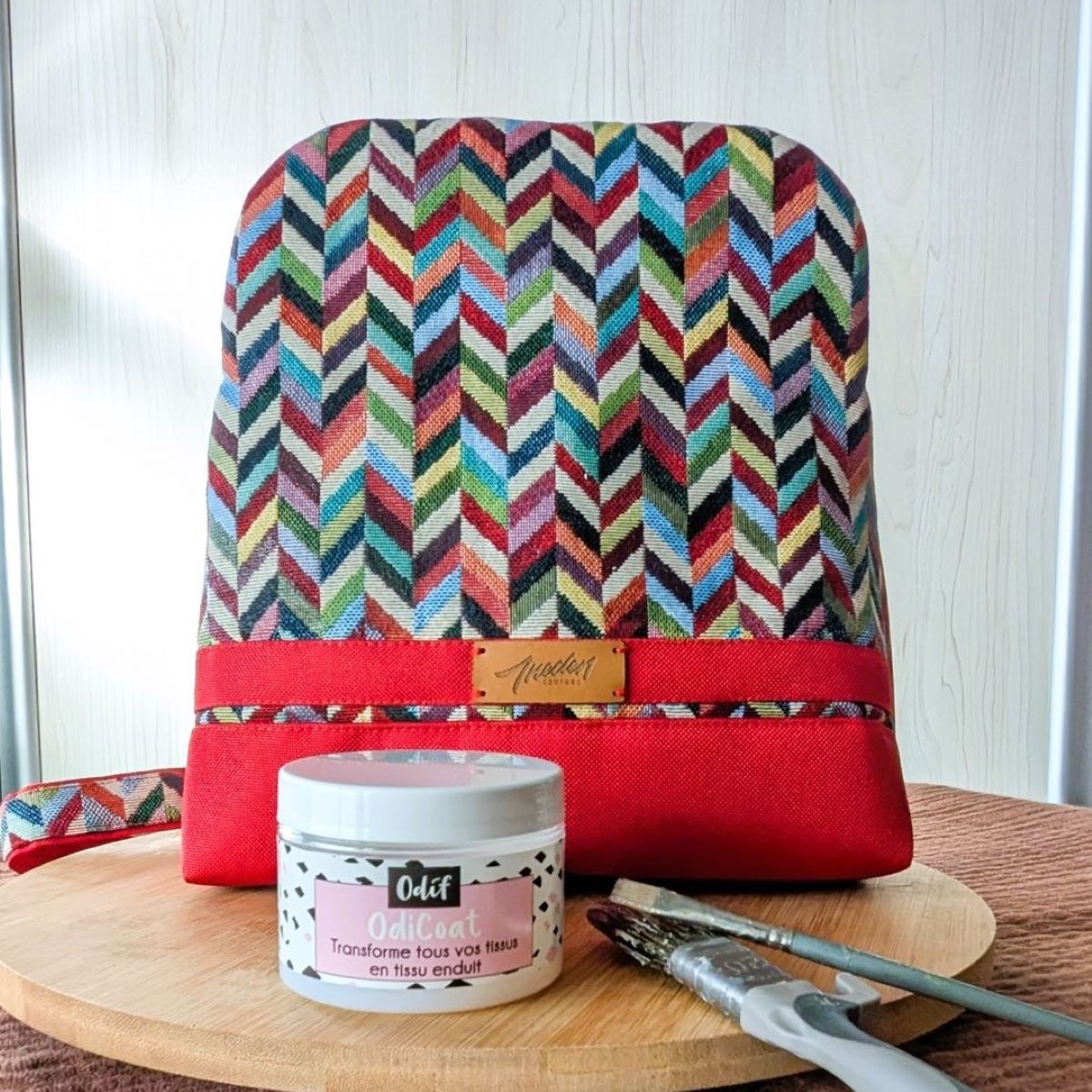 Sac Volte tissu jacquard rouge en cours d'enduction par OdiCoat