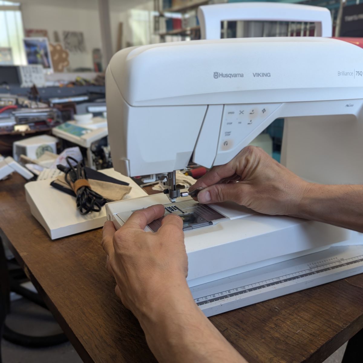 Machine à coudre chez le réparateur